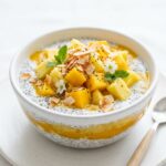 Tropical chia pudding breakfast bowl with mango, pineapple, and coconut