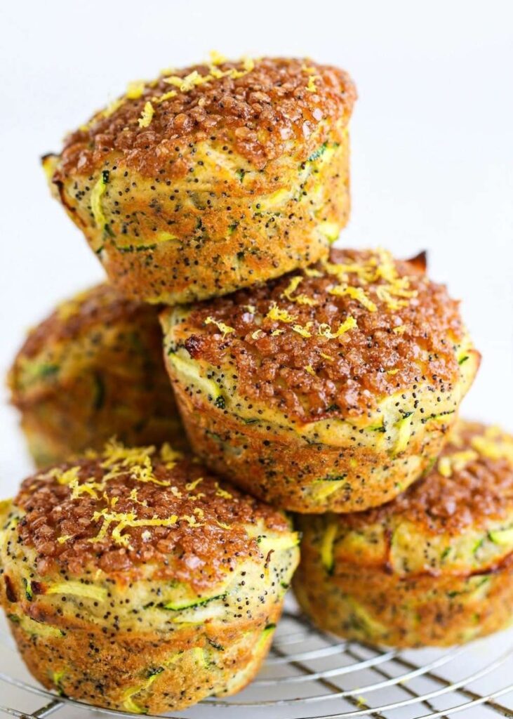 Lemon Poppyseed Zucchini Muffins lemon poppyseed zucchini muffins on a cooling rack