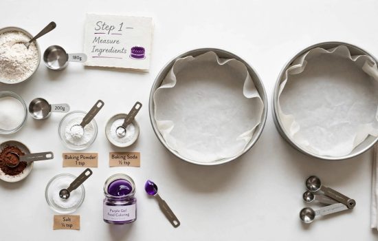 Preparing cake pans and ingredients for purple velvet cake