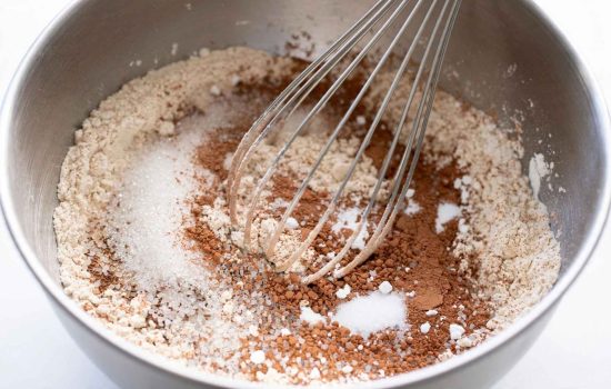 Whisking dry ingredients for purple velvet cake