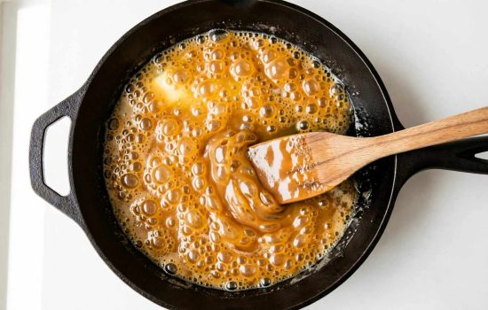 Melting butter and brown sugar into caramel