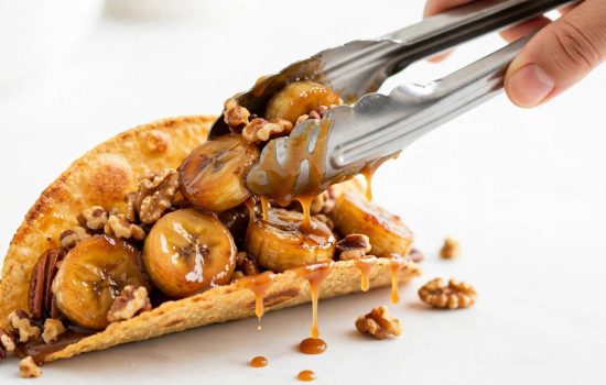 Assembling banana nuts tacos with caramelized bananas