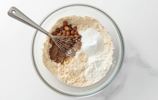 Dry ingredients being combined in a bowl.