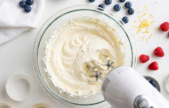 Beating cream cheese filling with a mixer